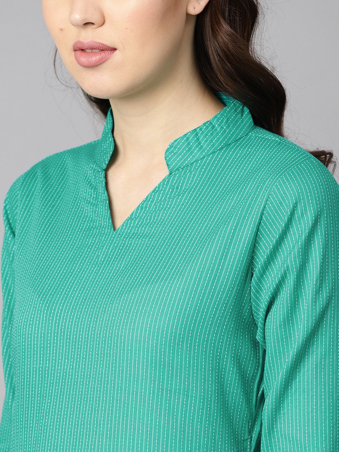 Solid Green Tagai-Work Straight Kurta With Detailing On The Cuff With White Straight Pants | LASVINI - Redefining Indian Fashion with Elegance