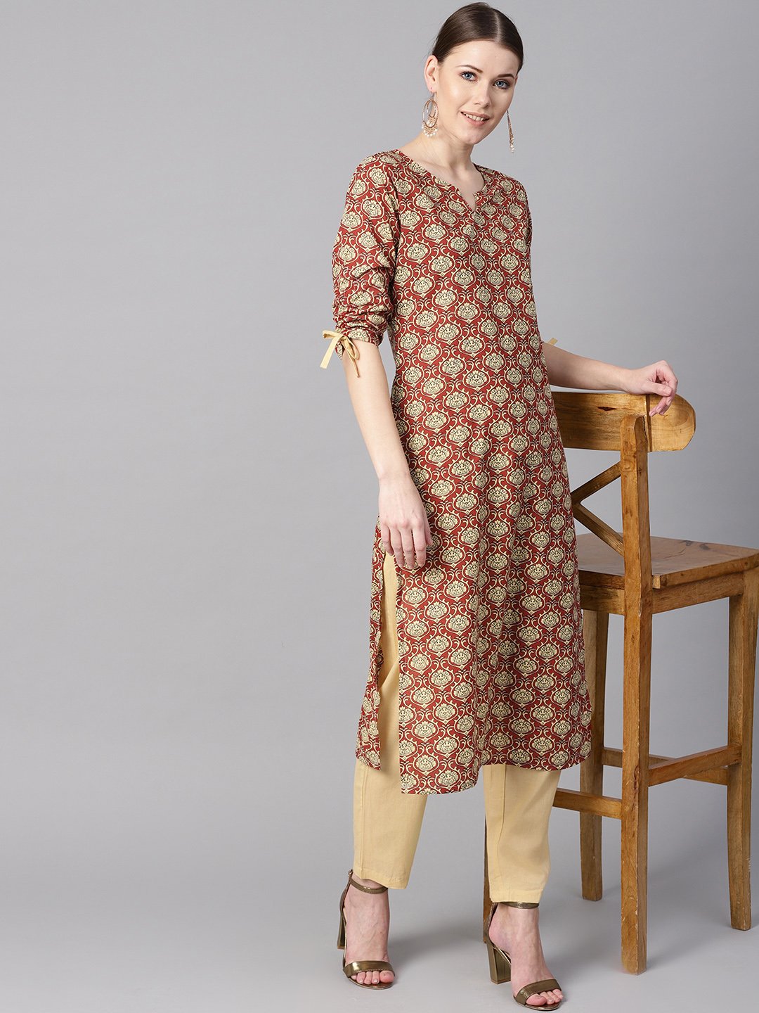 Maroon Floral Printed Kurta With Draw String Detailed Sleeves And Pale Yellow Pants | LASVINI - Redefining Indian Fashion with Elegance