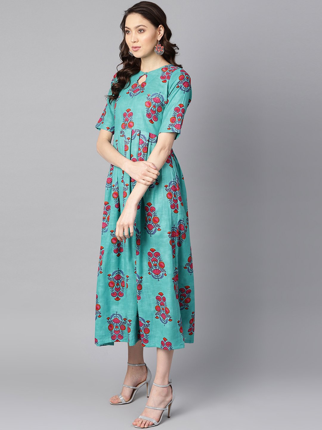 Turqish Blue Color Printed Half Sleeve Pleated Maxi Dress With Deep Back And Tassel Detailing. | LASVINI - Redefining Indian Fashion with Elegance