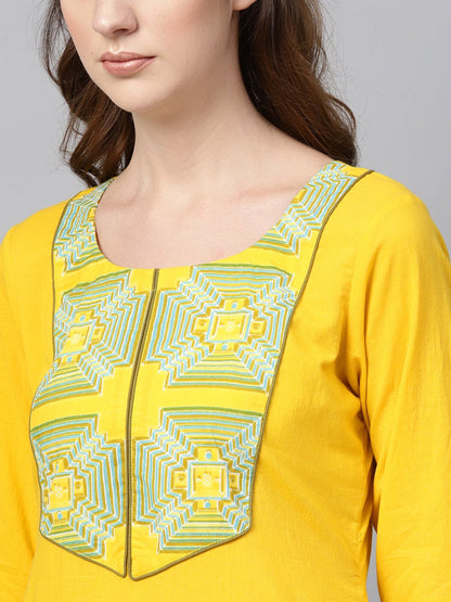 Solid Yellow Kurta Set With Front Printed Yoke & Printed Pants | LASVINI - Redefining Indian Fashion with Elegance