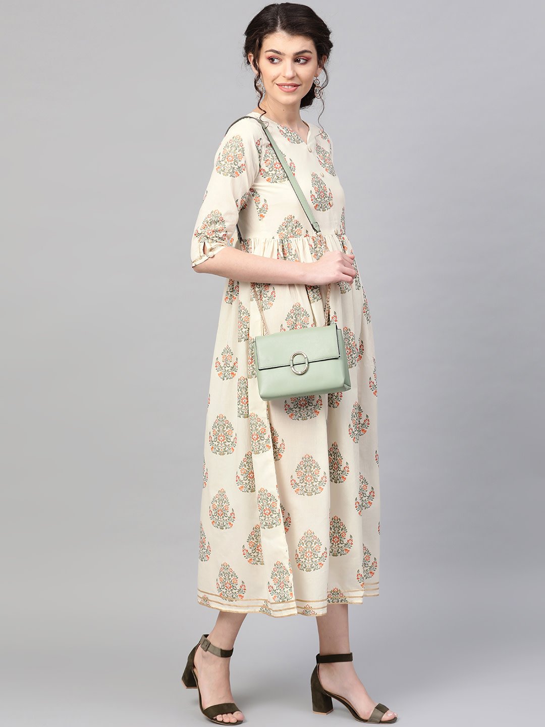 Women Off White & Gold Ethnic Motifs Printed Maxi Dress | LASVINI - Redefining Indian Fashion with Elegance