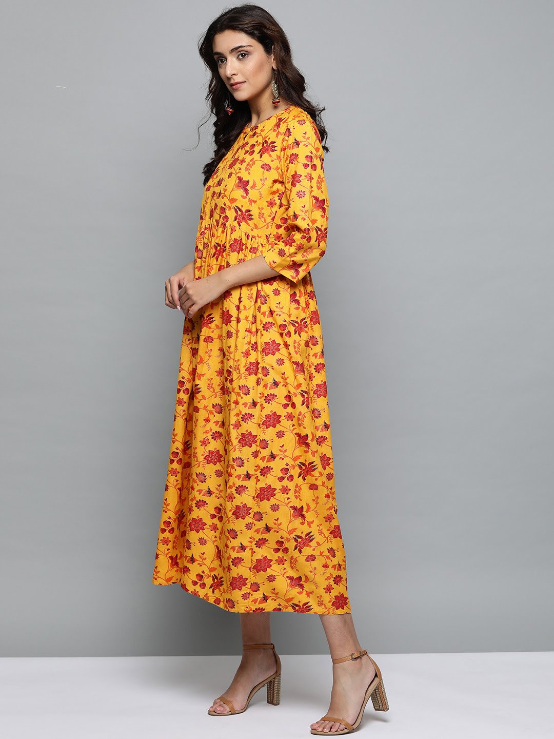 Women Mustard Yellow Floral Printed Round Neck A-Line Dress | LASVINI - Redefining Indian Fashion with Elegance