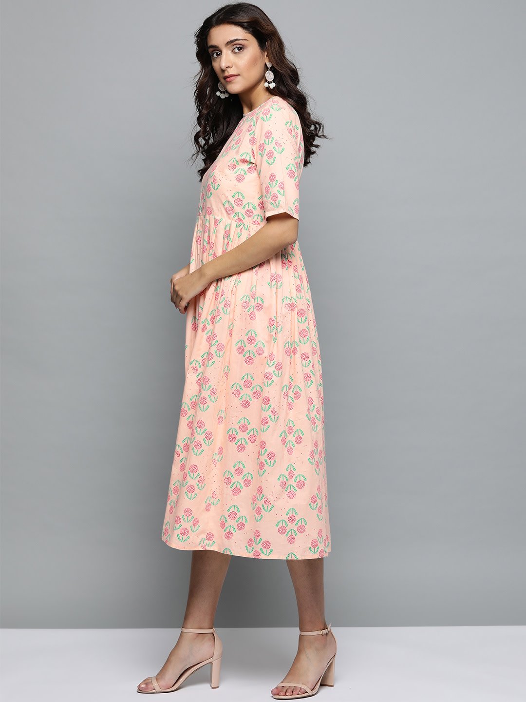 Women Peach Floral Printed Round Neck A-Line Dress | LASVINI - Redefining Indian Fashion with Elegance