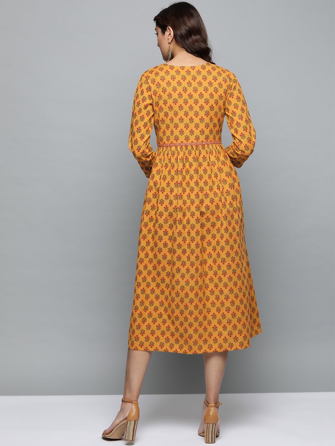 Women Mustard Yellow Floral Printed V-Neck A-Line Dress | LASVINI - Redefining Indian Fashion with Elegance