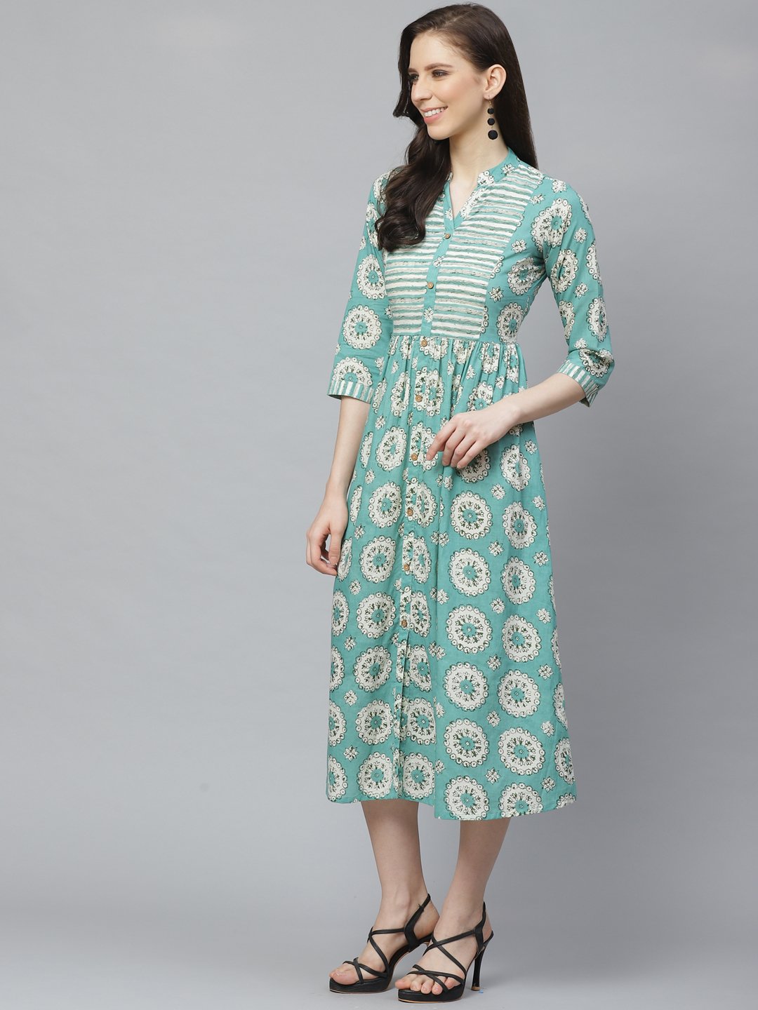 Women Green Conversational Printed Mandarin Collar Cotton A-Line Dress | LASVINI - Redefining Indian Fashion with Elegance