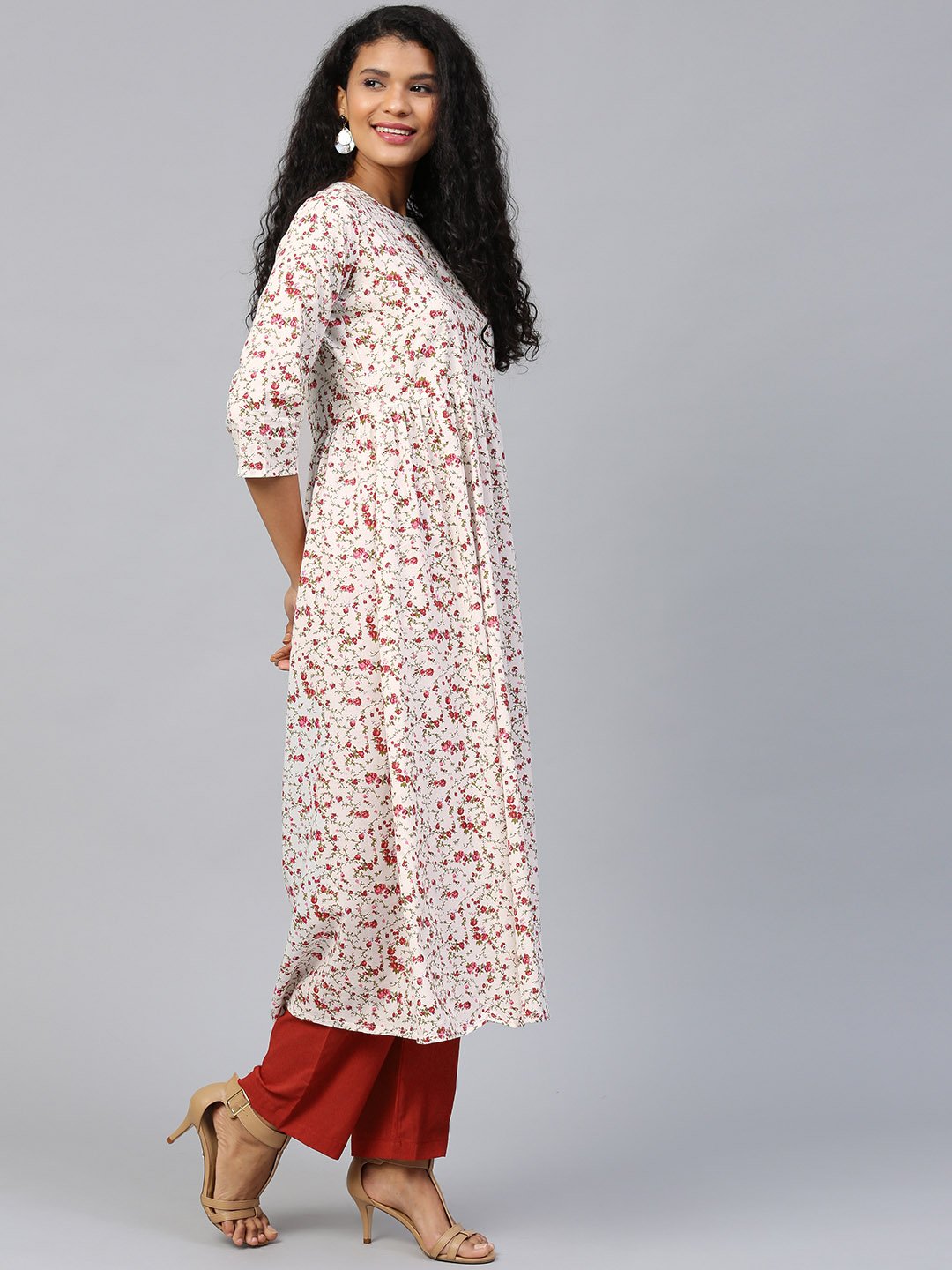 Women White Three-Quarter Sleeves Flared Kurta And Trouser Set | LASVINI - Redefining Indian Fashion with Elegance