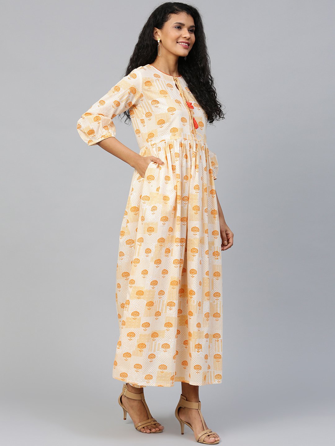 Women Off White Floral Printed Round Neck Cotton A-Line Dress | LASVINI - Redefining Indian Fashion with Elegance