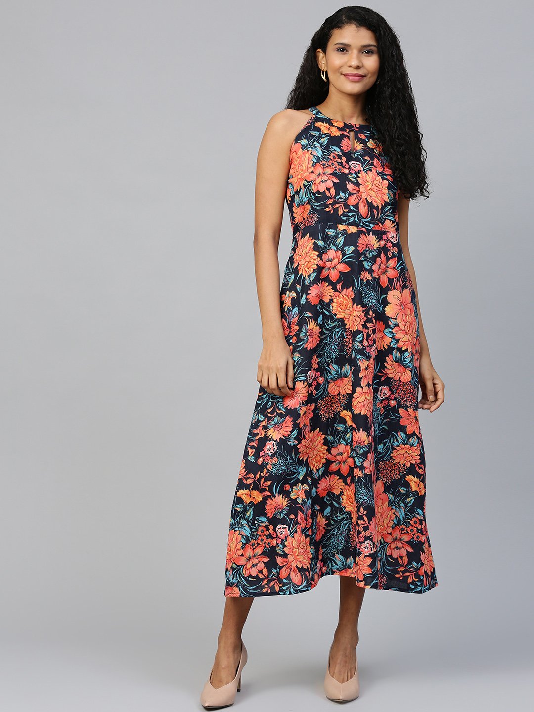Women Black Floral Printed Halter Neck Cotton A-Line Dress | LASVINI - Redefining Indian Fashion with Elegance