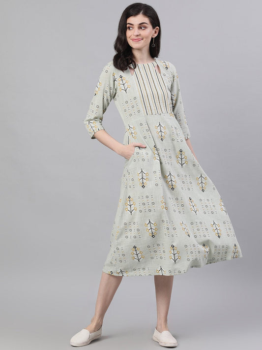 Women Sage Green Floral Printed Boat Neck Cotton A-Line Dress | LASVINI - Redefining Indian Fashion with Elegance
