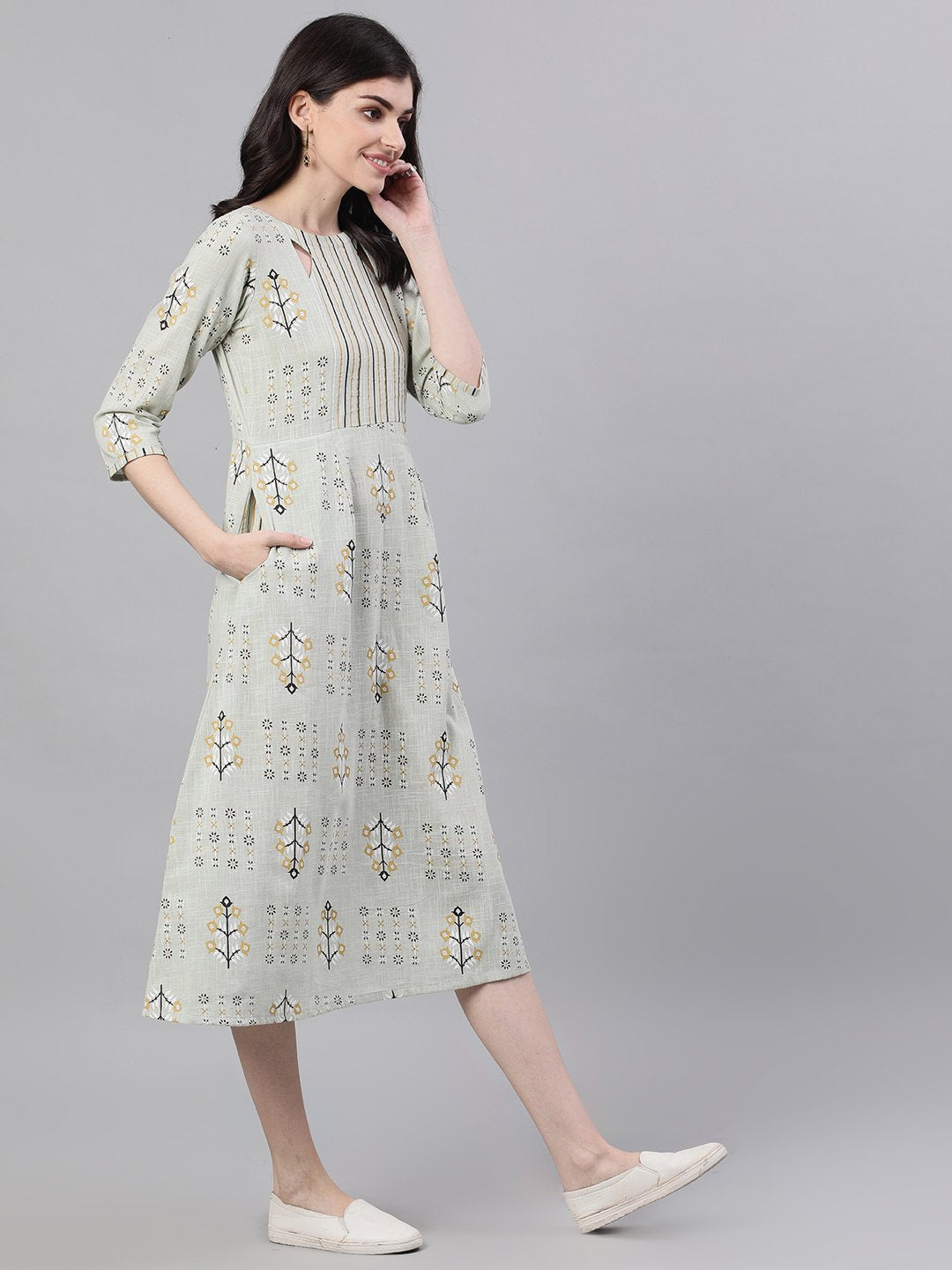 Women Sage Green Floral Printed Boat Neck Cotton A-Line Dress | LASVINI - Redefining Indian Fashion with Elegance