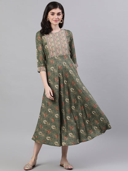 Women Green Geometric Printed Round Neck Cotton Maxi Dress | LASVINI - Redefining Indian Fashion with Elegance
