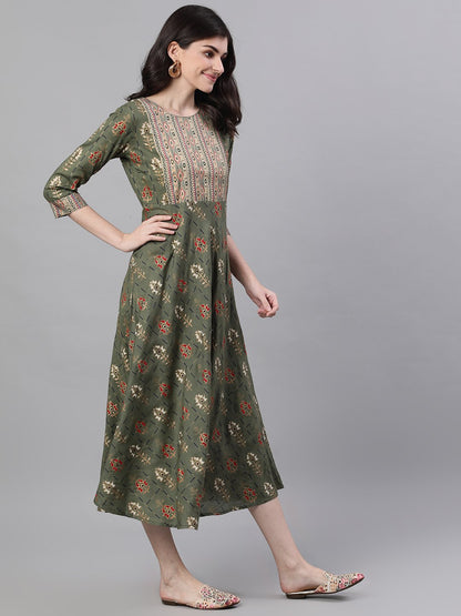 Women Green Geometric Printed Round Neck Cotton Maxi Dress | LASVINI - Redefining Indian Fashion with Elegance