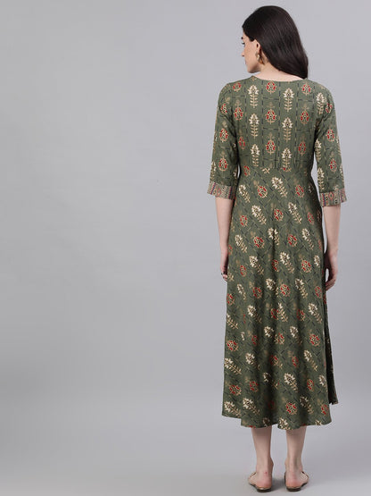 Women Green Geometric Printed Round Neck Cotton Maxi Dress | LASVINI - Redefining Indian Fashion with Elegance