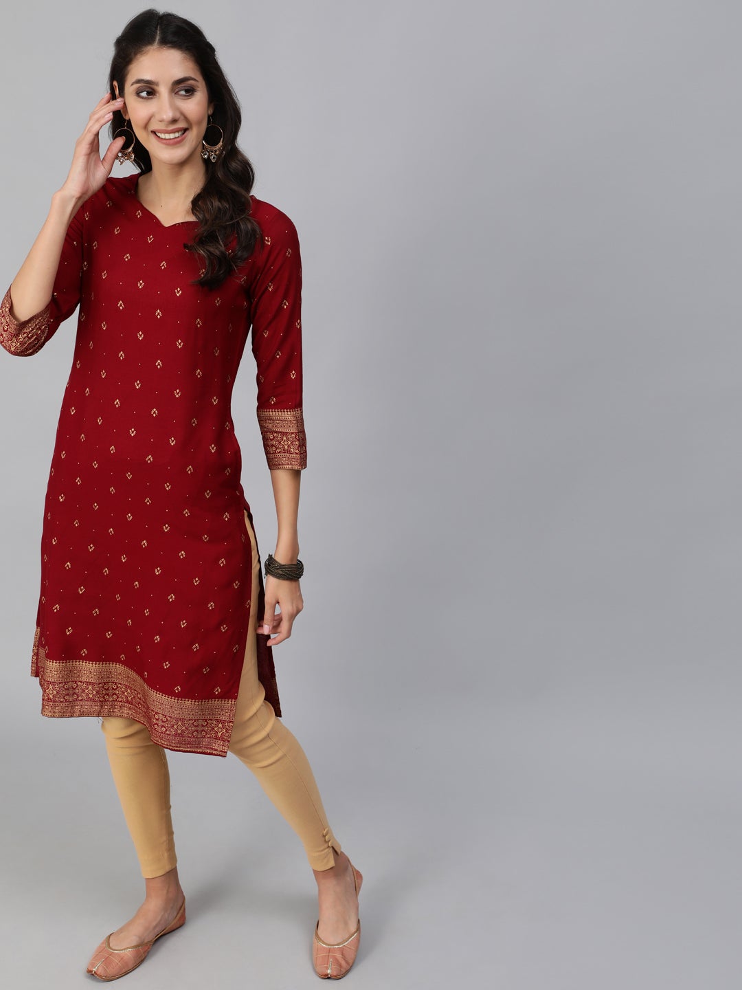 Women Maroon & Gold Printed Straight Kurta With Three Quarter Sleeves | LASVINI - Redefining Indian Fashion with Elegance