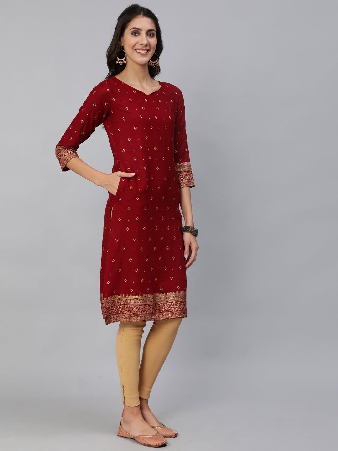 Women Maroon & Gold Printed Straight Kurta With Three Quarter Sleeves | LASVINI - Redefining Indian Fashion with Elegance