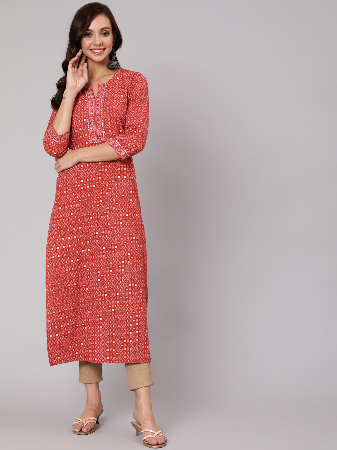 Women Rust Ethnic Printed Straight Kurta With Three Quarter Sleeves | LASVINI - Redefining Indian Fashion with Elegance