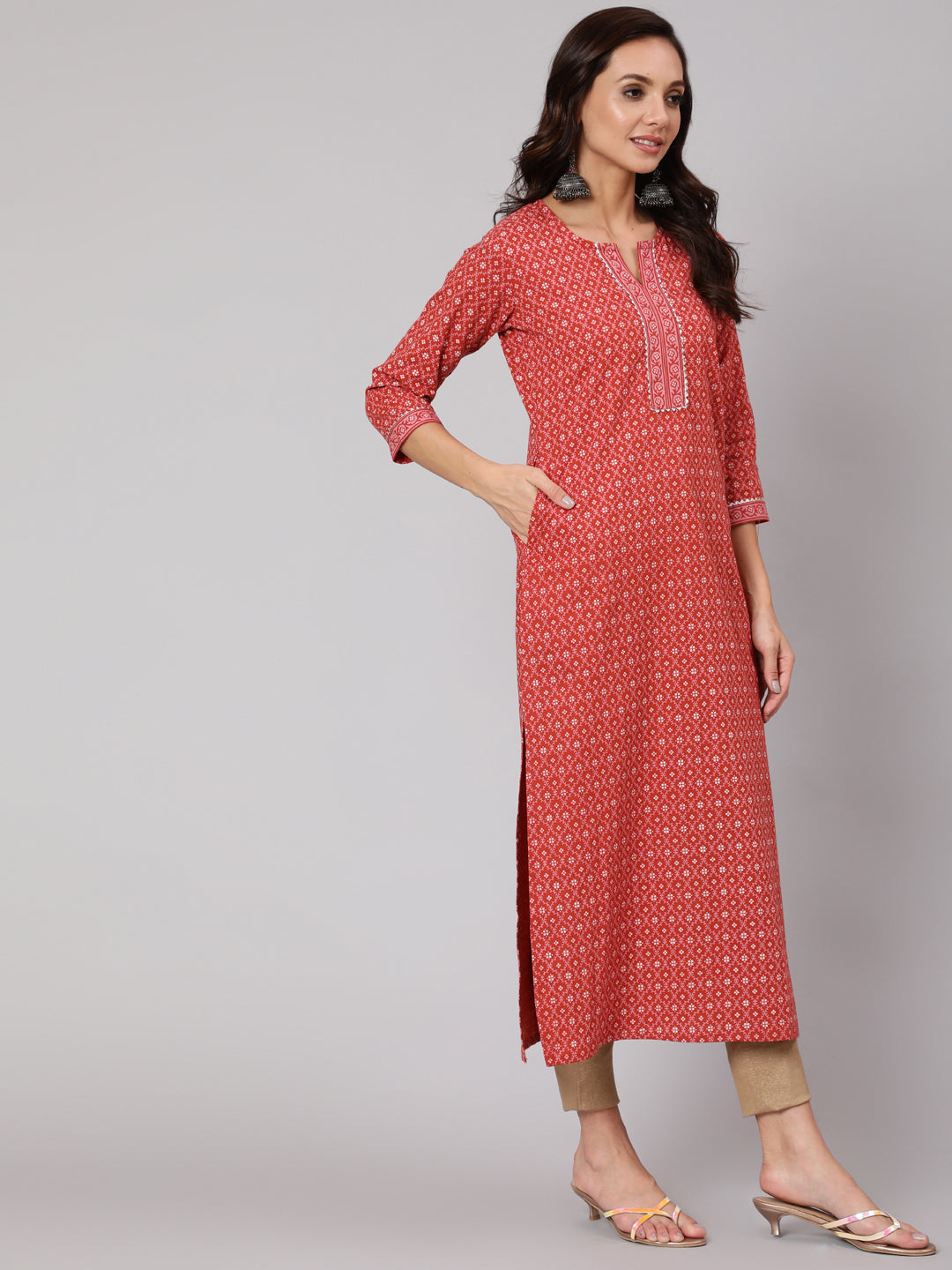 Women Rust Ethnic Printed Straight Kurta With Three Quarter Sleeves | LASVINI - Redefining Indian Fashion with Elegance