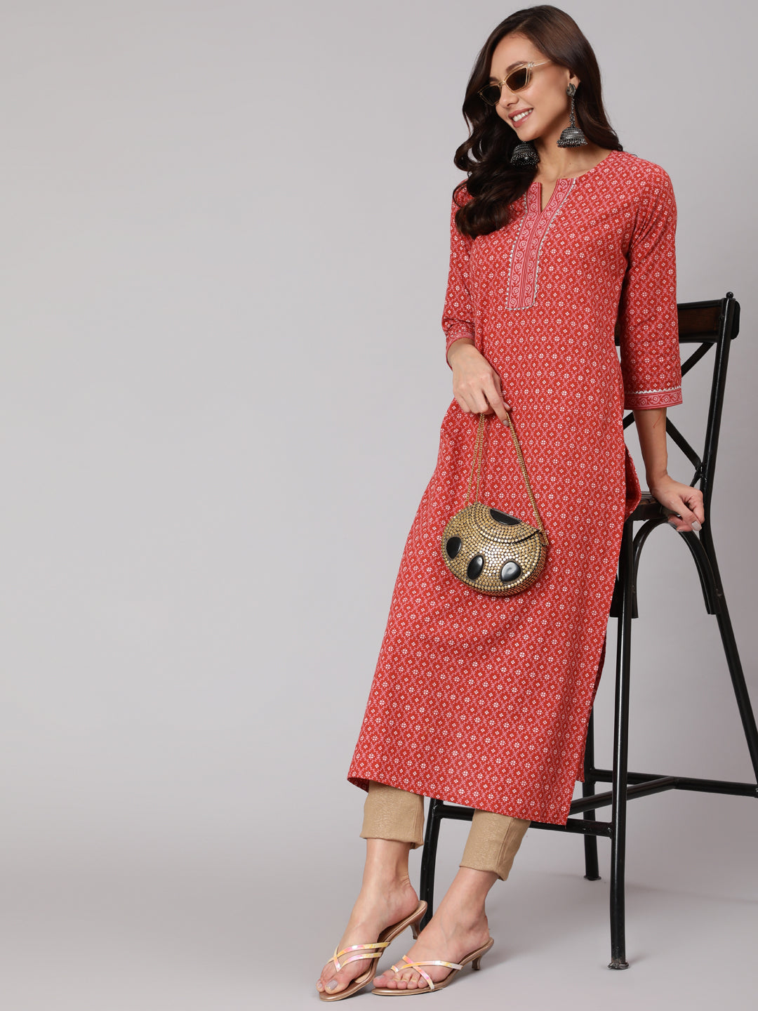 Women Rust Ethnic Printed Straight Kurta With Three Quarter Sleeves | LASVINI - Redefining Indian Fashion with Elegance