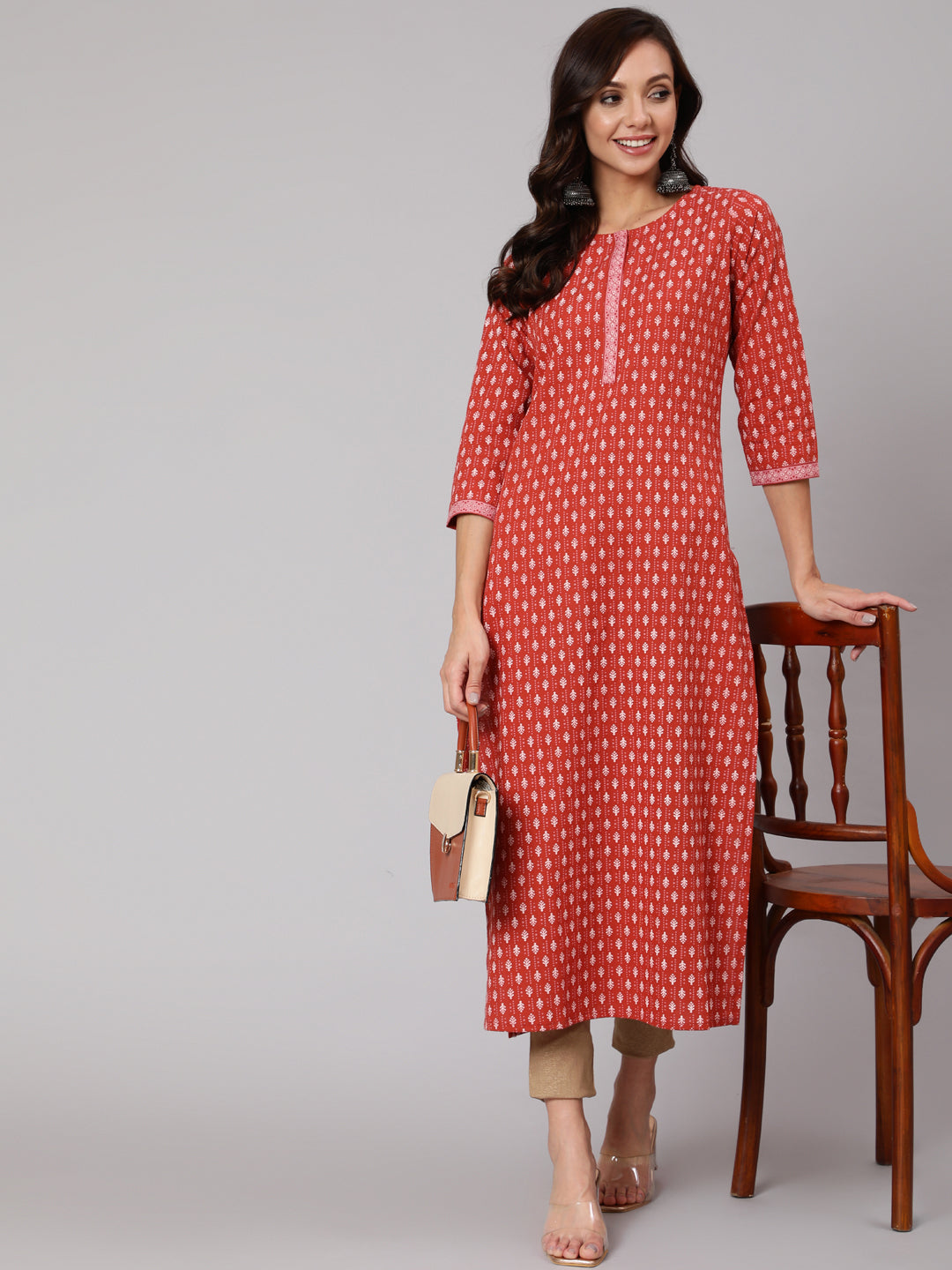 Women Rust Ethnic Printed Straight Kurta With Three Quarter Sleeves | LASVINI - Redefining Indian Fashion with Elegance