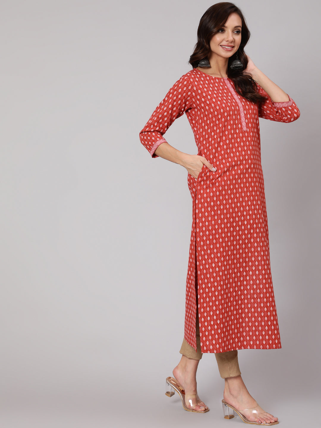 Women Rust Ethnic Printed Straight Kurta With Three Quarter Sleeves | LASVINI - Redefining Indian Fashion with Elegance