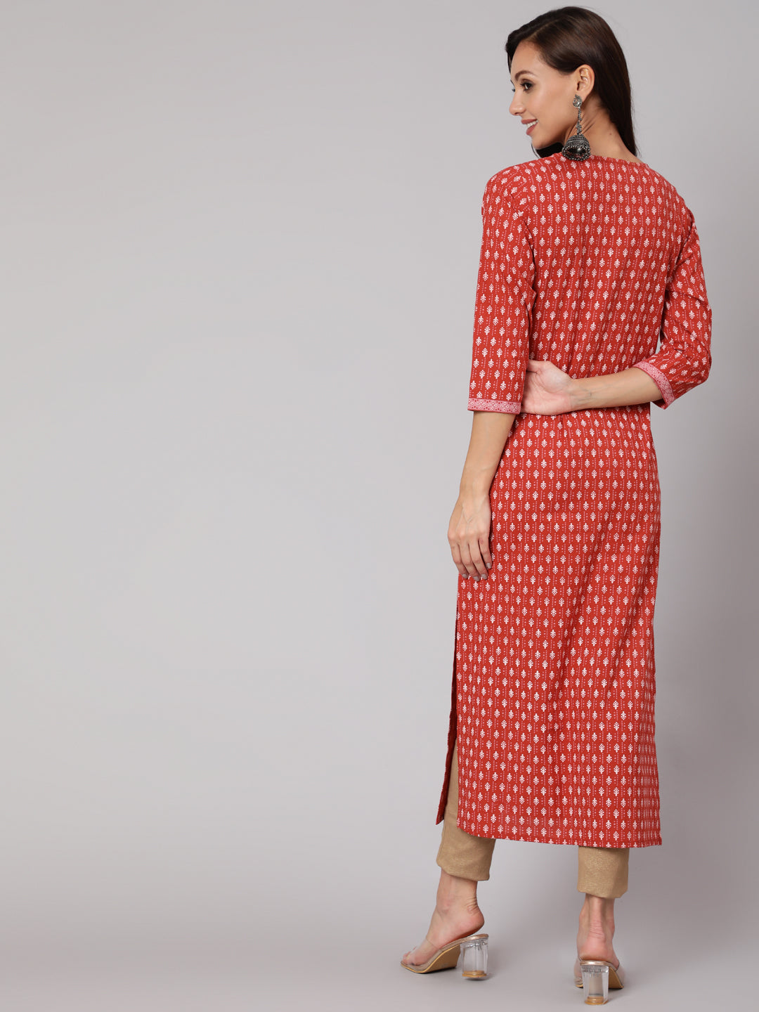 Women Rust Ethnic Printed Straight Kurta With Three Quarter Sleeves | LASVINI - Redefining Indian Fashion with Elegance