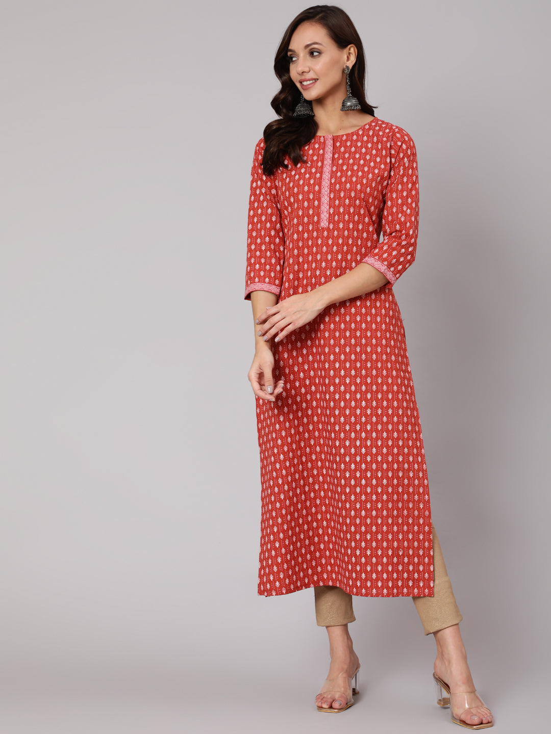 Women Rust Ethnic Printed Straight Kurta With Three Quarter Sleeves | LASVINI - Redefining Indian Fashion with Elegance