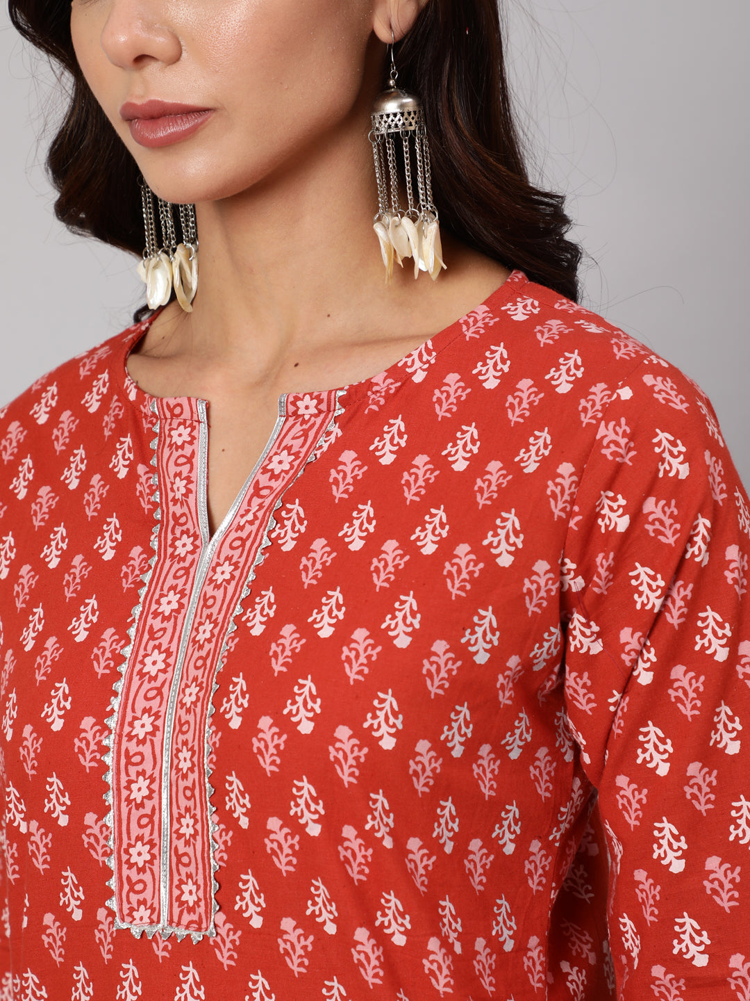 Women Rust Ethnic Printed Straight Kurta With Three Quarter Sleeves | LASVINI - Redefining Indian Fashion with Elegance