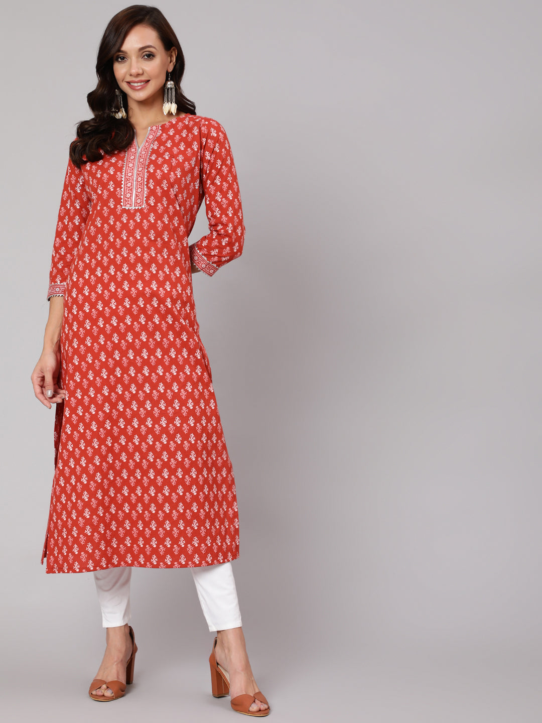 Women Rust Ethnic Printed Straight Kurta With Three Quarter Sleeves | LASVINI - Redefining Indian Fashion with Elegance