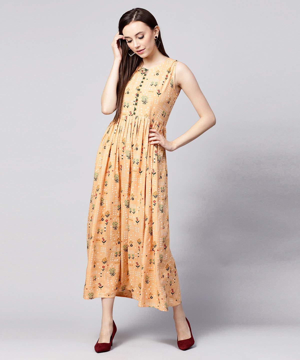 Yellow Printed Sleeveless Rayon A-Line Maxi Dress With Button  In Yokr | LASVINI - Redefining Indian Fashion with Elegance