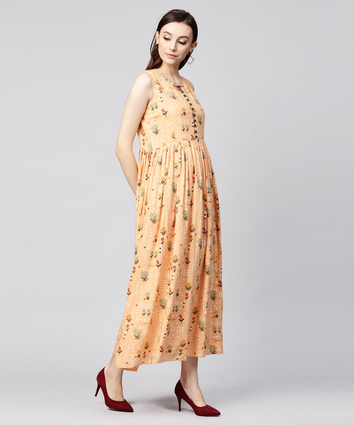 Yellow Printed Sleeveless Rayon A-Line Maxi Dress With Button  In Yokr | LASVINI - Redefining Indian Fashion with Elegance