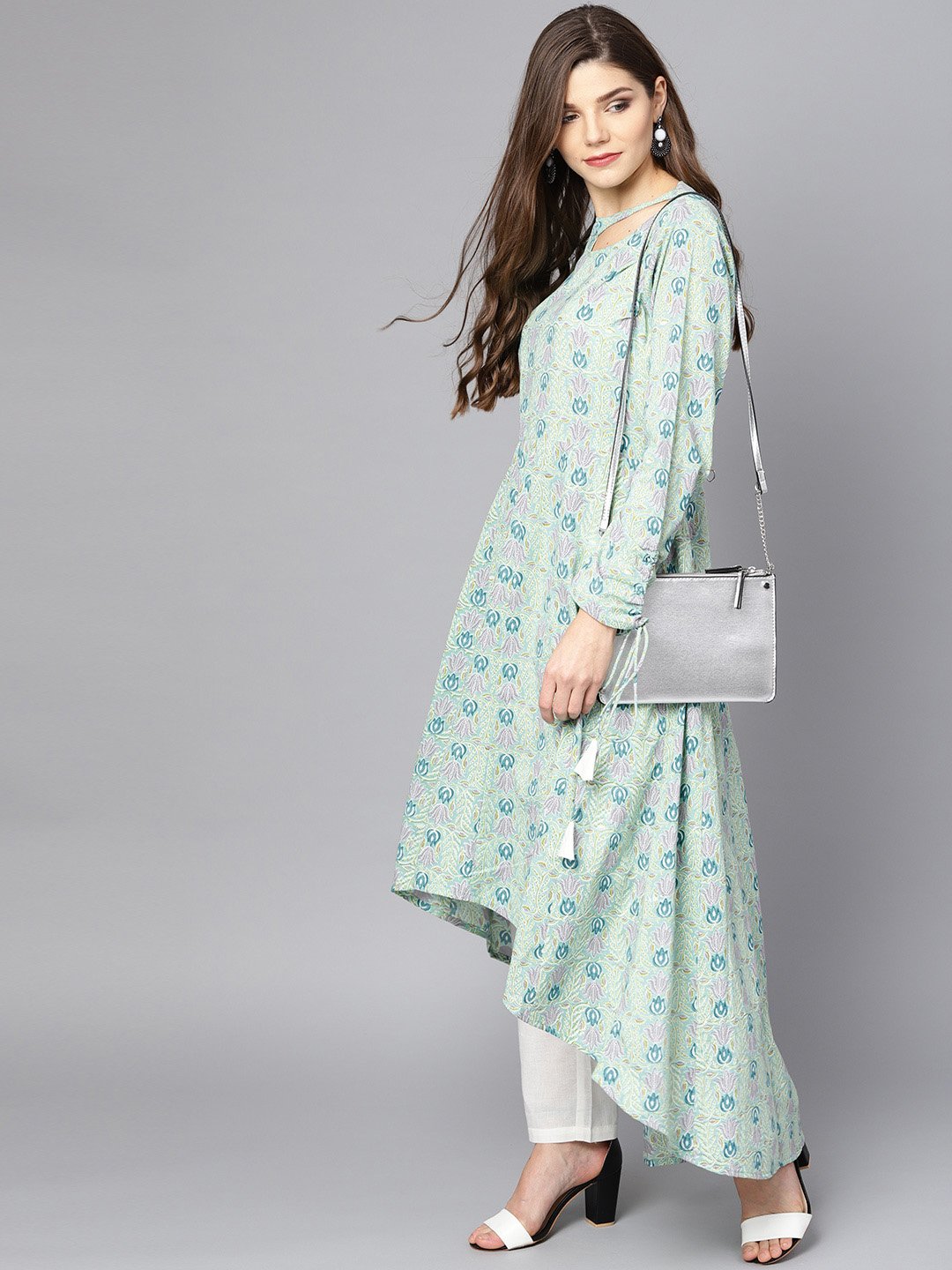 Pastel Green High-Low Kurta Set With White Palazzo | LASVINI - Redefining Indian Fashion with Elegance
