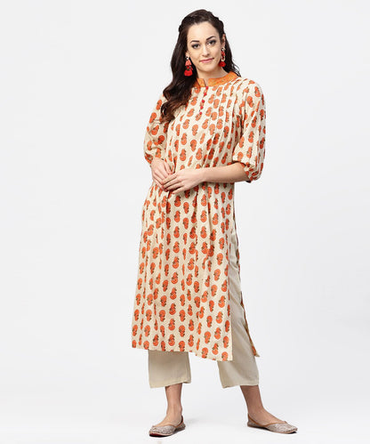 Off White & Red Printed 3/4Th Sleeve Cotton Pleated A-Line Kurta With Beige Pallazo | LASVINI - Redefining Indian Fashion with Elegance