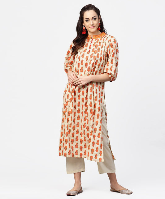 Off White & Red Printed 3/4Th Sleeve Cotton Pleated A-Line Kurta With Beige Pallazo | LASVINI - Redefining Indian Fashion with Elegance