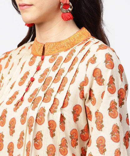 Off White & Red Printed 3/4Th Sleeve Cotton Pleated A-Line Kurta With Beige Pallazo | LASVINI - Redefining Indian Fashion with Elegance