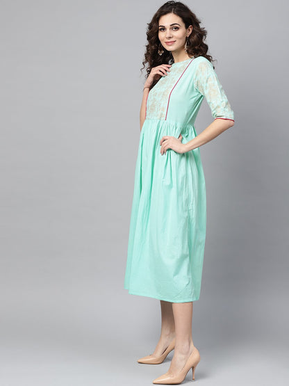 Pastel Green Dress With Front Gold Printed Yoke & 3/4 Sleeves | LASVINI - Redefining Indian Fashion with Elegance