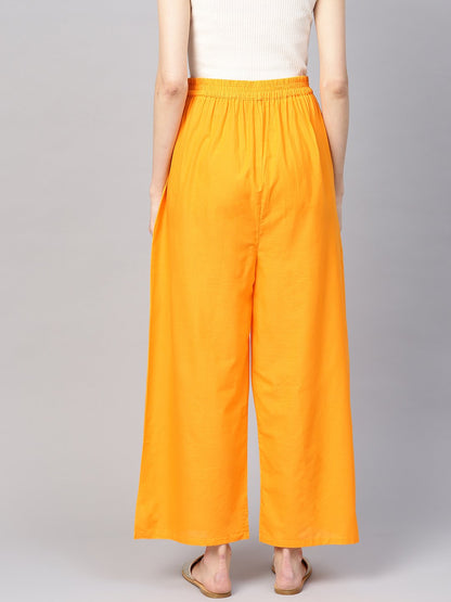 Women Orange Solid Wide Leg Palazzos | LASVINI - Redefining Indian Fashion with Elegance