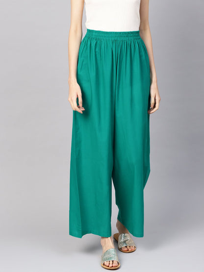 Women Green Solid Wide Leg Palazzos | LASVINI - Redefining Indian Fashion with Elegance
