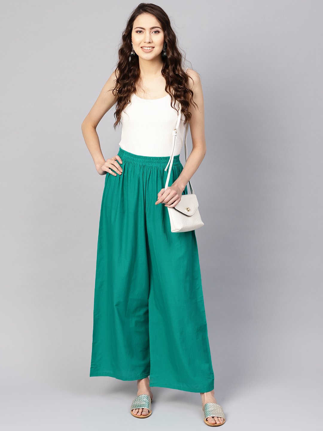 Women Green Solid Wide Leg Palazzos | LASVINI - Redefining Indian Fashion with Elegance