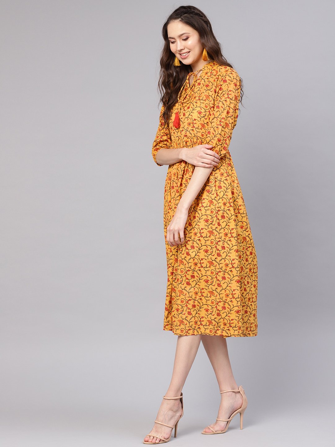 Women Mustard Yellow & Red Printed A-Line Dress | LASVINI - Redefining Indian Fashion with Elegance