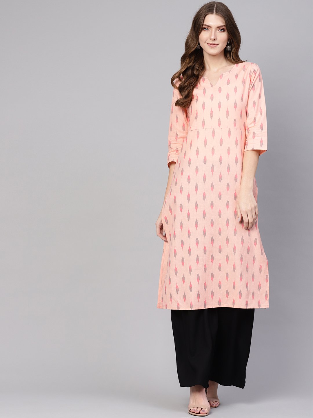 Women Peach-Coloured & Black Ikat Print Straight Kurta | LASVINI - Redefining Indian Fashion with Elegance