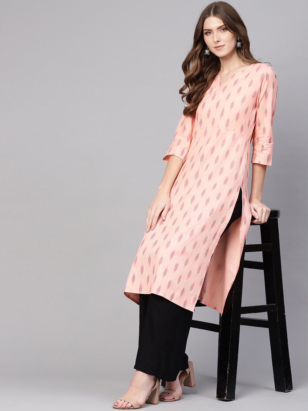 Women Peach-Coloured & Black Ikat Print Straight Kurta | LASVINI - Redefining Indian Fashion with Elegance