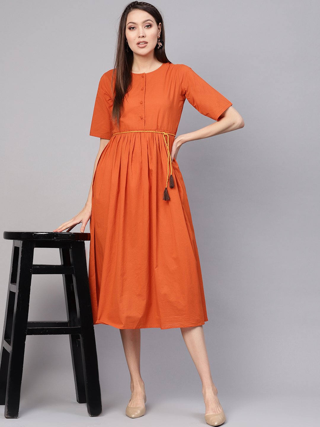 Women Rust Orange Solid A-Line Dress | LASVINI - Redefining Indian Fashion with Elegance