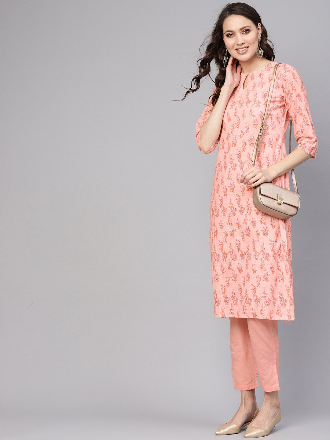Women Peach-Coloured Printed Kurta With Trousers | LASVINI - Redefining Indian Fashion with Elegance