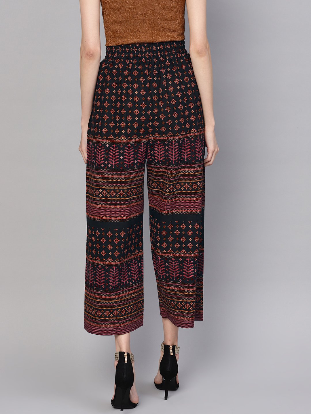 Women Black & Orange Printed Cropped Straight Palazzos | LASVINI - Redefining Indian Fashion with Elegance