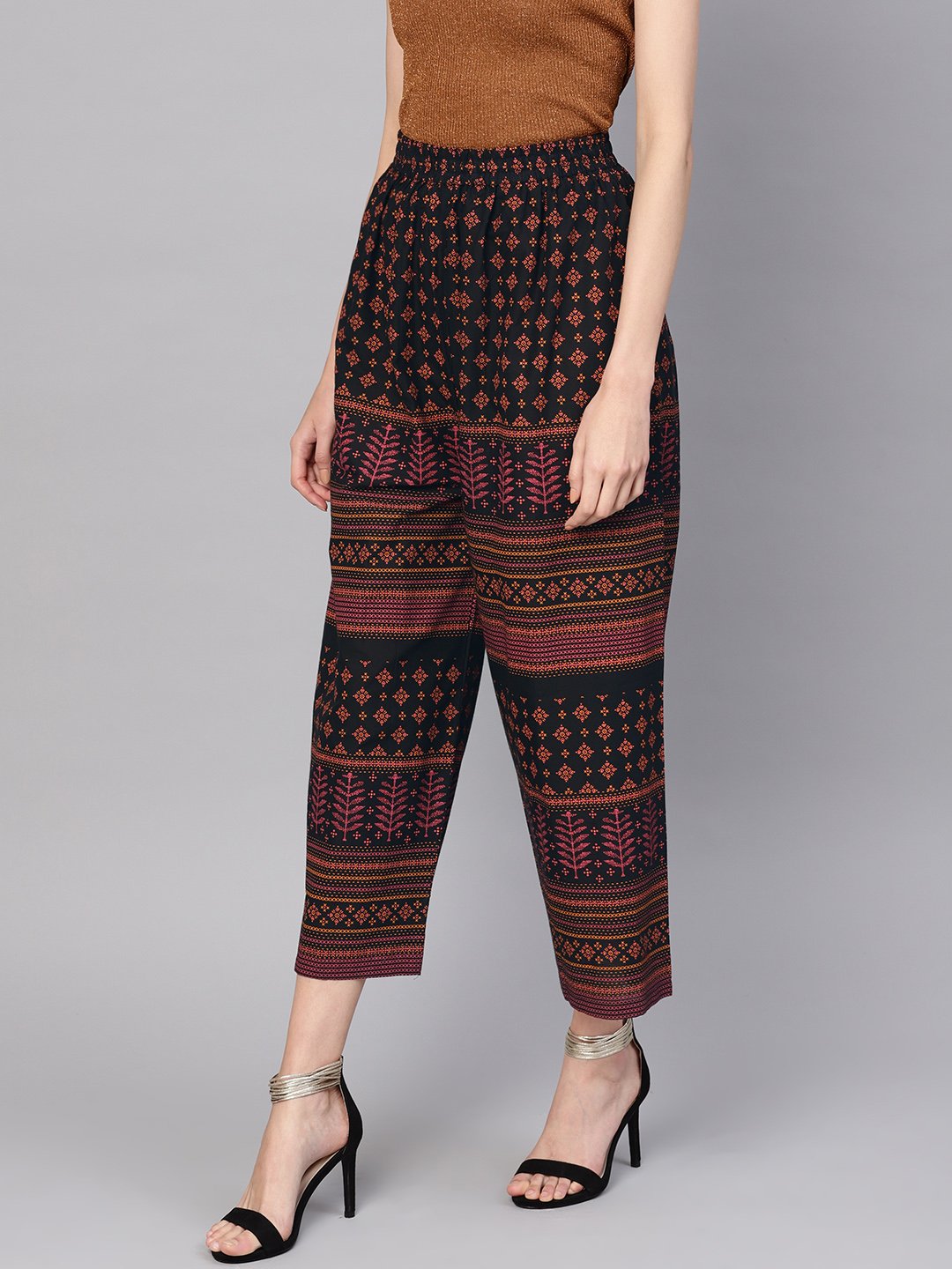Women Black & Orange Printed Cropped Straight Palazzos | LASVINI - Redefining Indian Fashion with Elegance