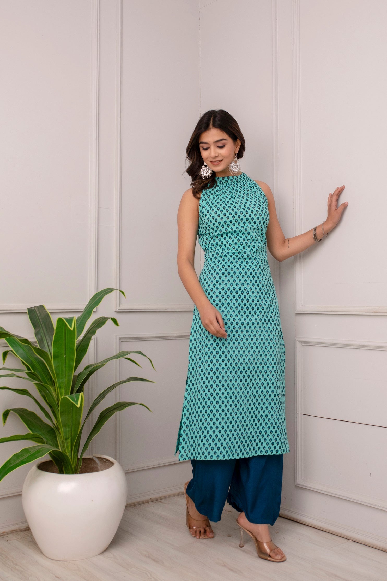 Women Green Printed High Slit Sleeveless Cotton Kurta | LASVINI - Redefining Indian Fashion with Elegance