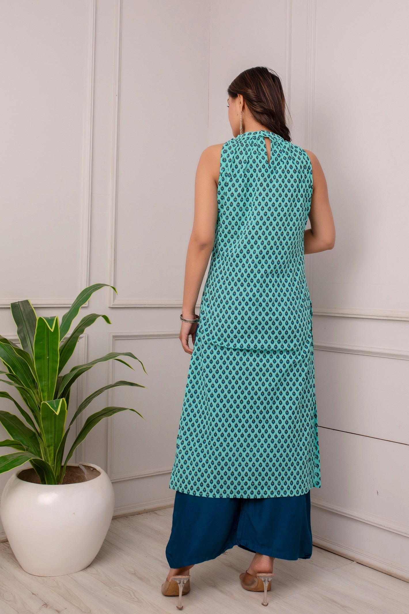 Women Green Printed High Slit Sleeveless Cotton Kurta | LASVINI - Redefining Indian Fashion with Elegance