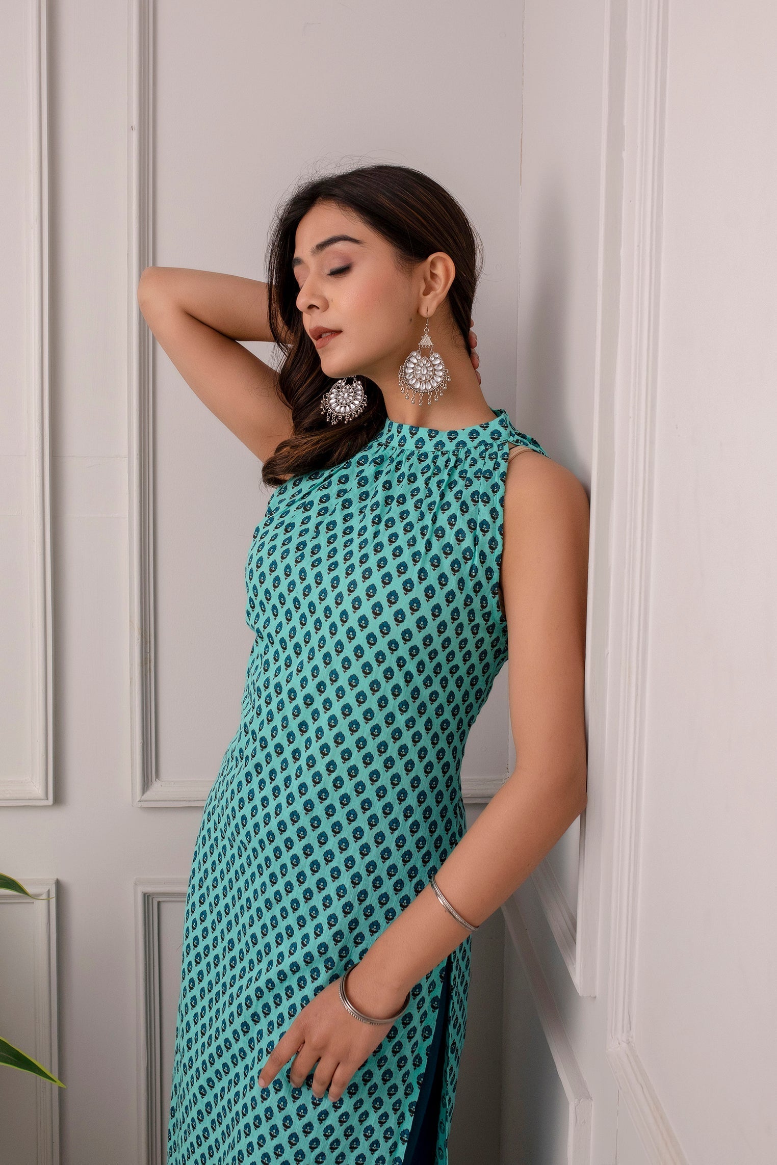 Women Green Printed High Slit Sleeveless Cotton Kurta | LASVINI - Redefining Indian Fashion with Elegance
