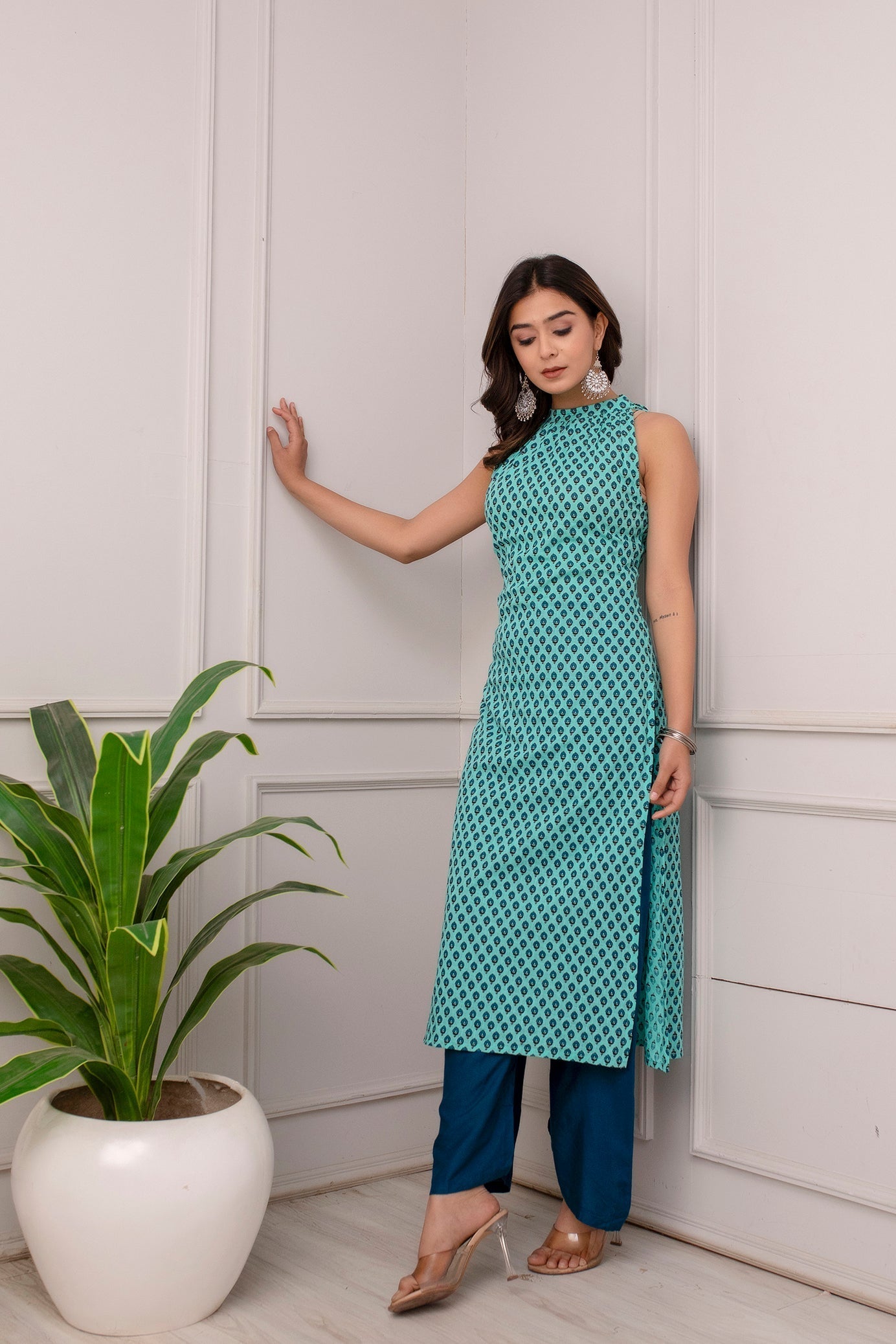 Women Green Printed High Slit Sleeveless Cotton Kurta | LASVINI - Redefining Indian Fashion with Elegance