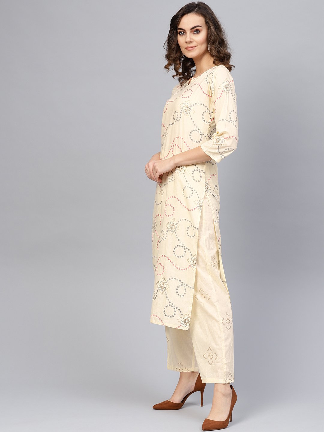 Women Cream-Coloured & Red Printed Kurta With Trousers | LASVINI - Redefining Indian Fashion with Elegance